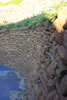 Drystone basalt retaining wall with terraces