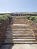 Hand-chiselled sandstone steps with basalt retaining wall